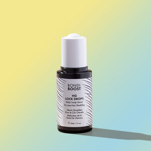 1 fl oz | Bondi Boost HG Lock Drops serum bottle on a gradient background