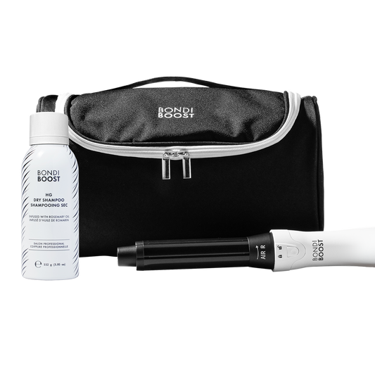 Black 'Bondi Boost' travel bag with a bottle and everlast on a white background