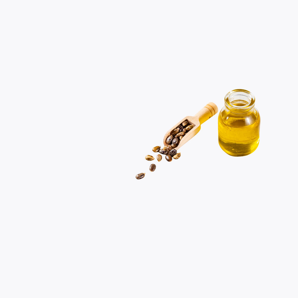 Jar of oil with scattered seeds on a white background