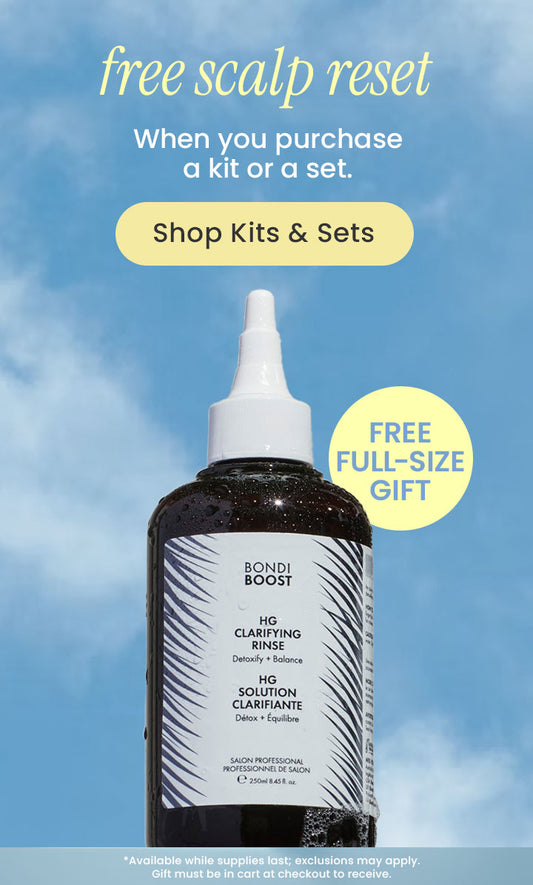 Bottle of Bondi Boost hair product with promotional text against a blue sky background