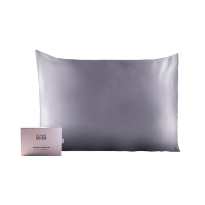 Silk pillowcase with packaging on a black background