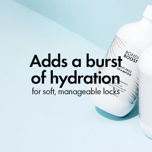 Shampoo bottle with text about hydration on a light blue background