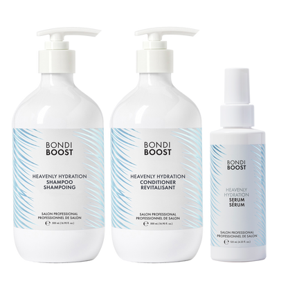 Three bottles of Bondi Boost hair care products on a white background