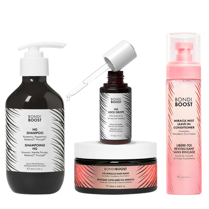 Collection of Bondi Boost hair care products including shampoo, serum, mask, and conditioner on a white background.