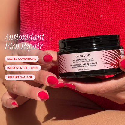 Person holding a hair mask jar with text highlighting its benefits against a red background